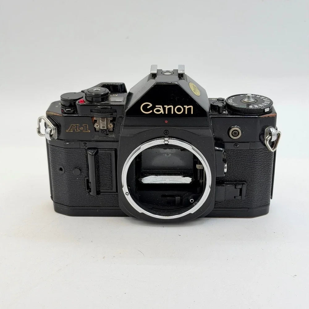 Lot of 2 Canon A-1 35mm SLR Film Camera Body Black Vintage Tested - For Parts